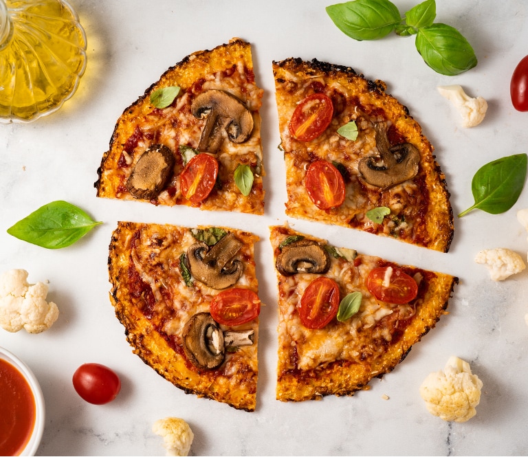 cauliflower pizza crust offers a healthier alternative to traditional pizza, combining lower carbs, gluten-free benefits, and enhanced nutritional value while satisfying pizza cravings. Its versatility makes it a popular choice for various dietary preferences.